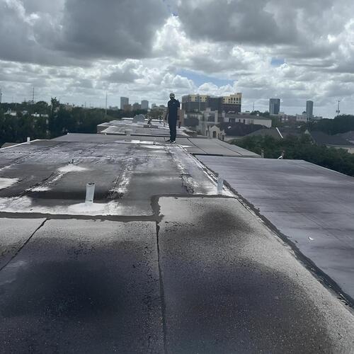 roofer on a commercial roof